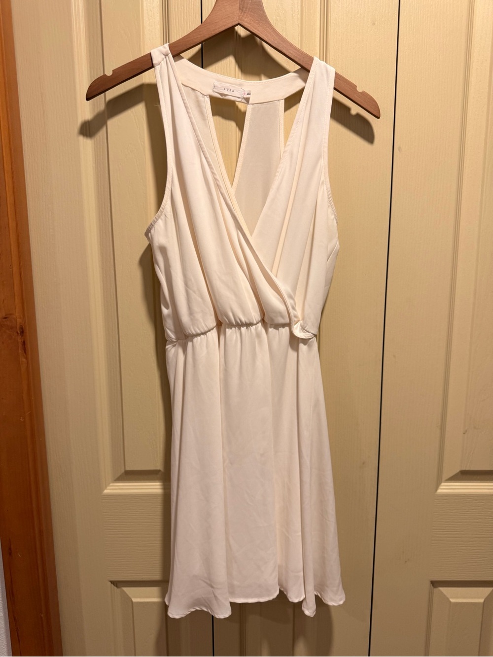 Lush Cream Sleeveless Wrap Mini Dress